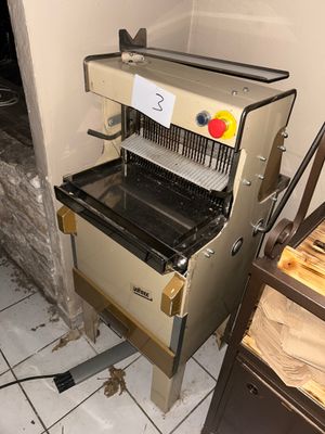 a machine that is sitting in the corner of a room