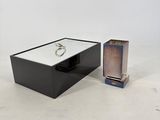 an image of a box with a ring on it and a box with a ring on it