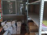 a room with a lot of boxes and boxes on the floor