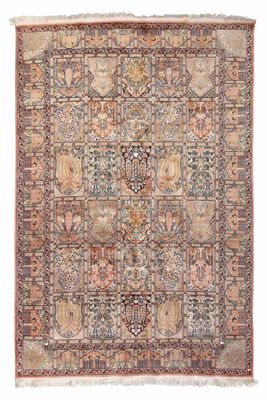 an antique persian rug with a multicolored design