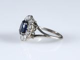 an oval sapphire and diamond cluster ring