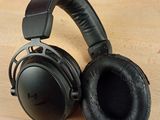 a pair of headphones sitting on a table next to a box