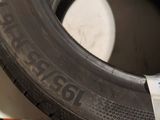 a close up of a tire on a pile of tires