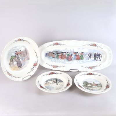 un ensemble d'assiettes et de bols décorés d'une peinture