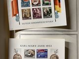 a lot of stamps on the pages of a book