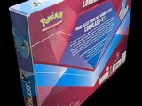 a box that has a picture of a pokemon figure inside of it