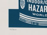 a picture of a blue and white sign that says black indoor / outdoor hazard world
