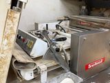 an image of a kitchen with a lot of food on the counter