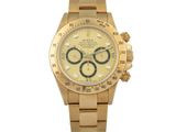 Montre Rolex avec cadran doré et lunette sertie de diamants