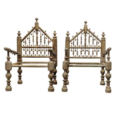 pair of antique iron beds with wooden posts and posts