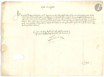 un vieux document sur lequel figure une lettre manuscrite au recto