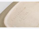 a close up of a white plate with writing on it