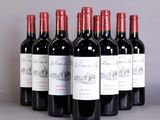 six bottles of red wine are lined up in a row