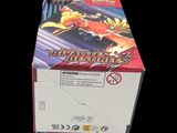 a box of pokemon trading cards sitting on a table