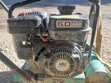 a small engine that is sitting in the dirt