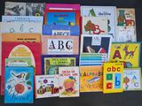 many children ' s books on the table together
