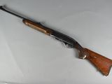 the rifle is laying on the table ready to be used