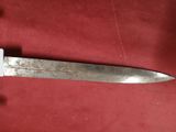 a knife that is sitting on top of a table