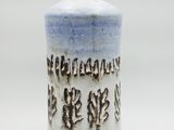 an image of a blue and white vase with writing on it