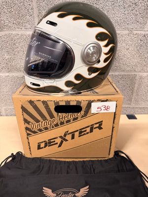a helmet on top of a box on a table
