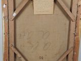 an old picture frame with a piece of paper taped to it