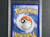 a close up of a pokemon card in a plastic case