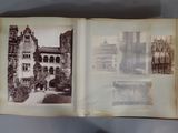 an open book with a picture of a castle on it