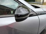 a close up of a car ' s side mirror with the word state on it
