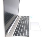 a close up of a laptop computer on a white surface