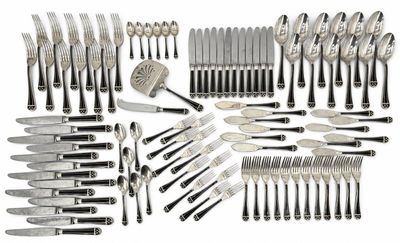 an assortment of silverware including forks, knives and spoons