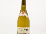 l'image d'une bouteille de vin posée sur une table