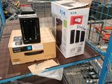 two boxes on a shelf in a store with a phone on it