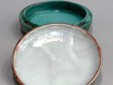 two bowls that are sitting next to each other on a table