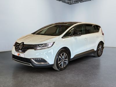 a white car is parked in a white room with a black floor