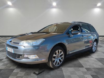 a picture of a car that is parked in a garage