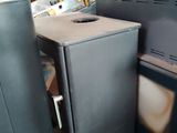a black stove and a black oven in a room