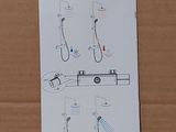 a picture of a cardboard box with instructions on how to use a shower head