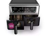 an image of a coffee machine with a coffee pot in it