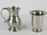 pair of silverplated jugs and a silver plated cup