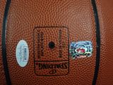 a close up of a basketball with a sticker on it
