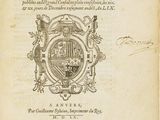 an old book with a picture of a coat of arms on it