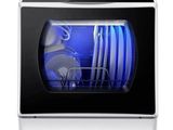 an image of a dishwasher with a lot of dishes in it