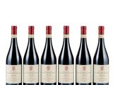 six bottles of red wine lined up in a row