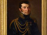 portrait of a man in a military uniform in a gold frame