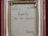 une vieille photo représentant un homme et une femme, dans un cadre