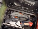 a black case with tools in it sitting on a table