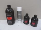 three bottles of shampooe and two bottles of shampooe on the counter