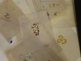 many different types of jewelry on the table