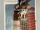 une photo d'une photo représentant un homme en costume de samouraï