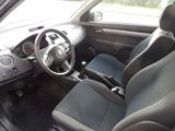 a picture of a car with a steering wheel and a dashboard